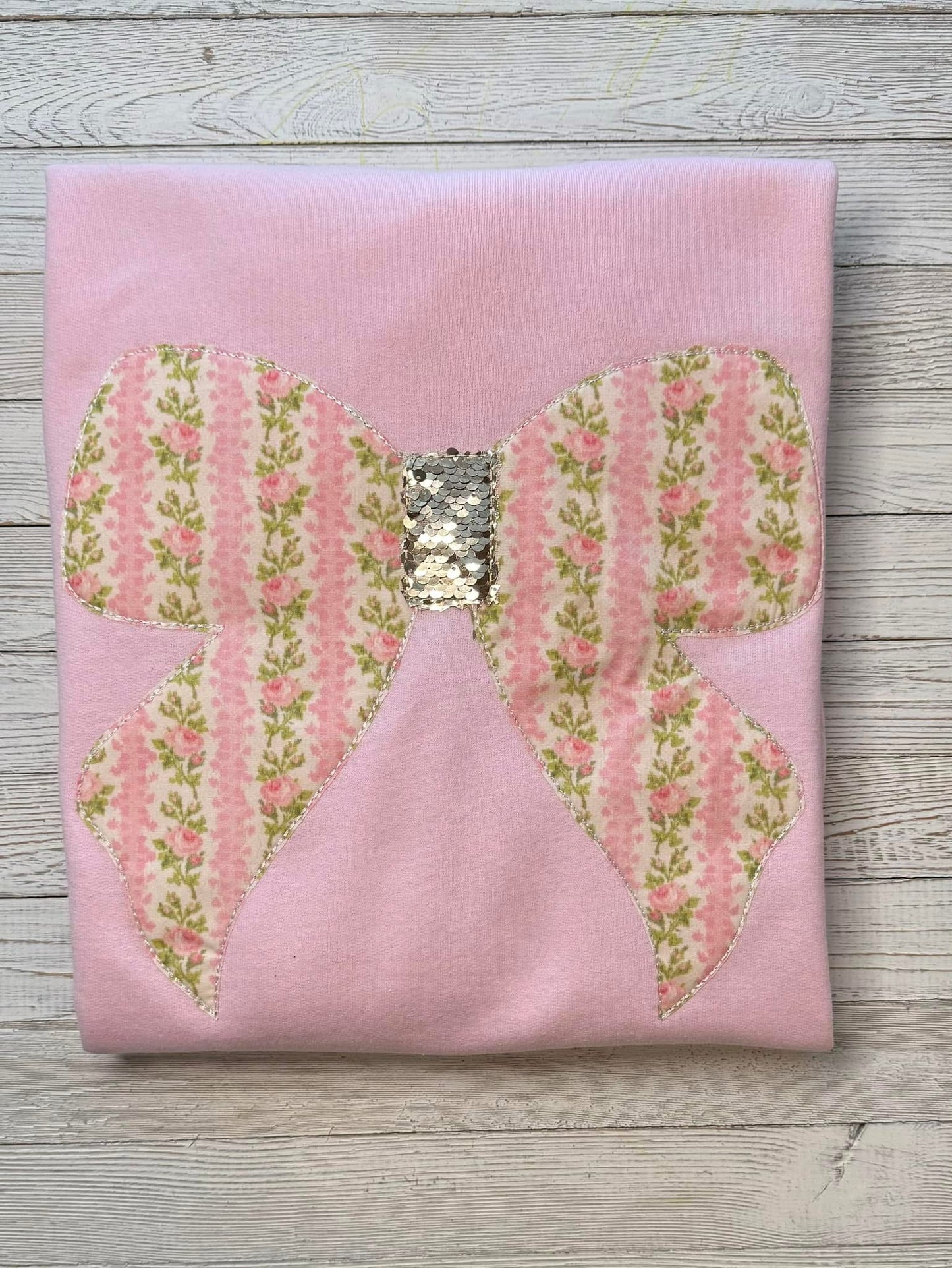 Oversized bow crewneck